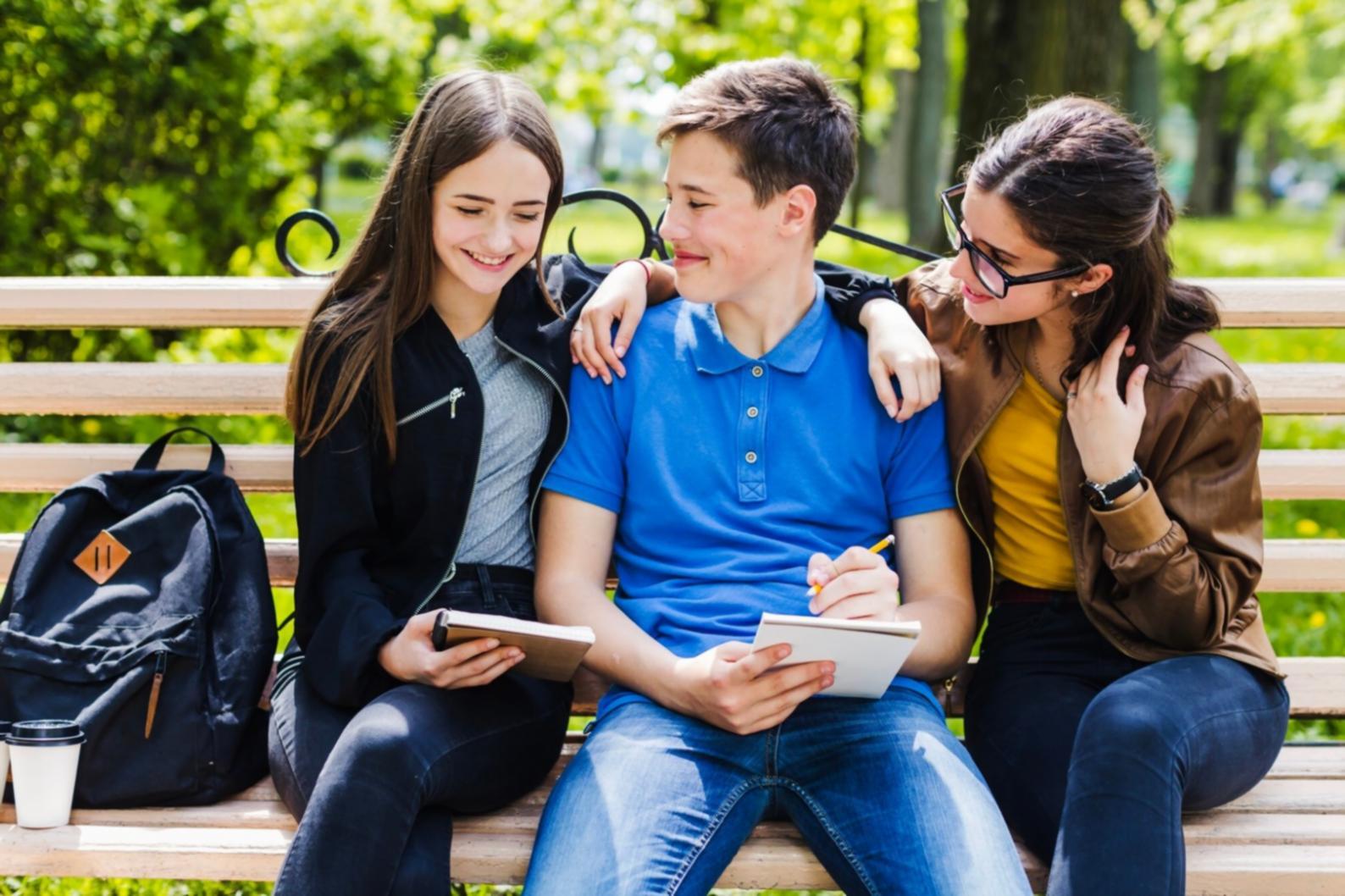 Professional analyzing economic trends and market data on multiple screens